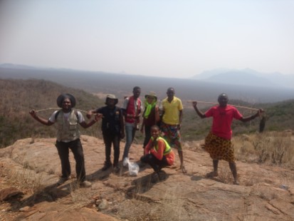 Some of the students and our guides on the Nejoio complex. Looking northeast, the large peralkaline Lutala complex (Sierra de Neve) can be seen in the background